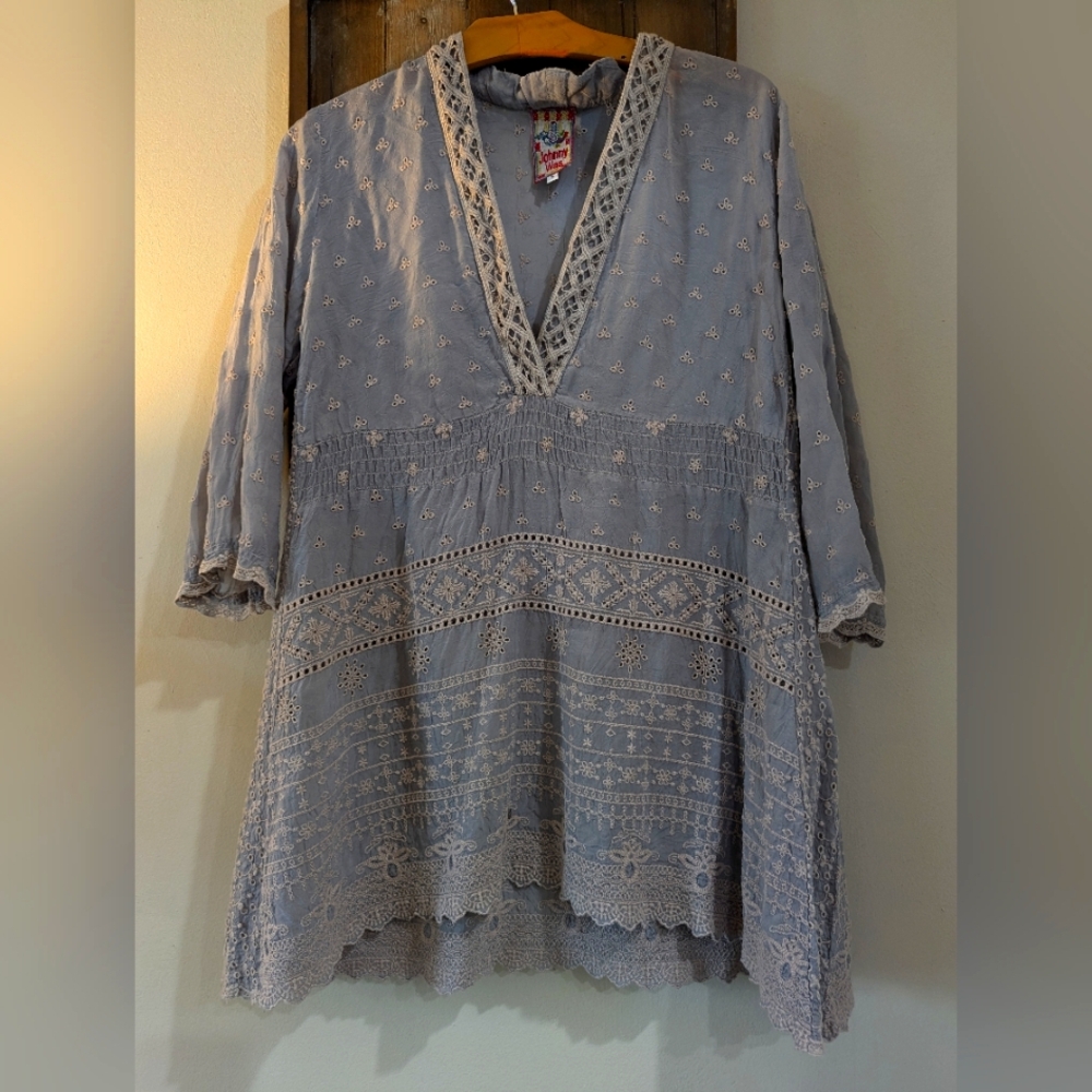 Johnny was kind of a taupe gray color size small can fit med